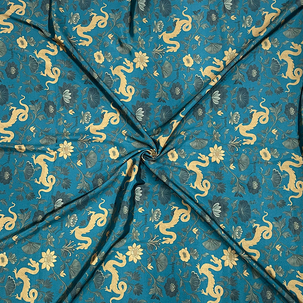 Kareena Dragon Flower Print with Teal Blue Color Base on Pure Natural Crepe