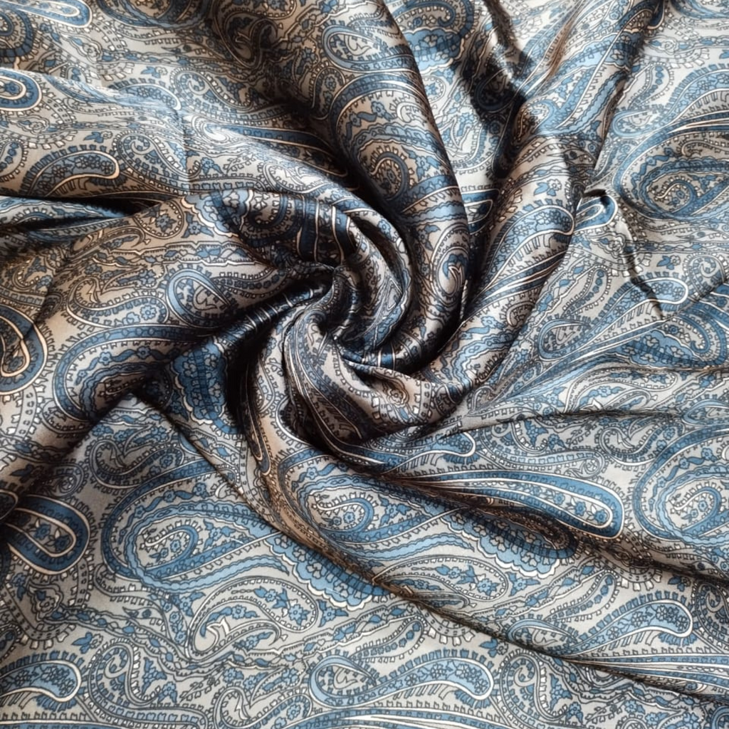 Timeless Elegance: Satin Georgette Fabrics Adorned with Traditional Paisley Motifs