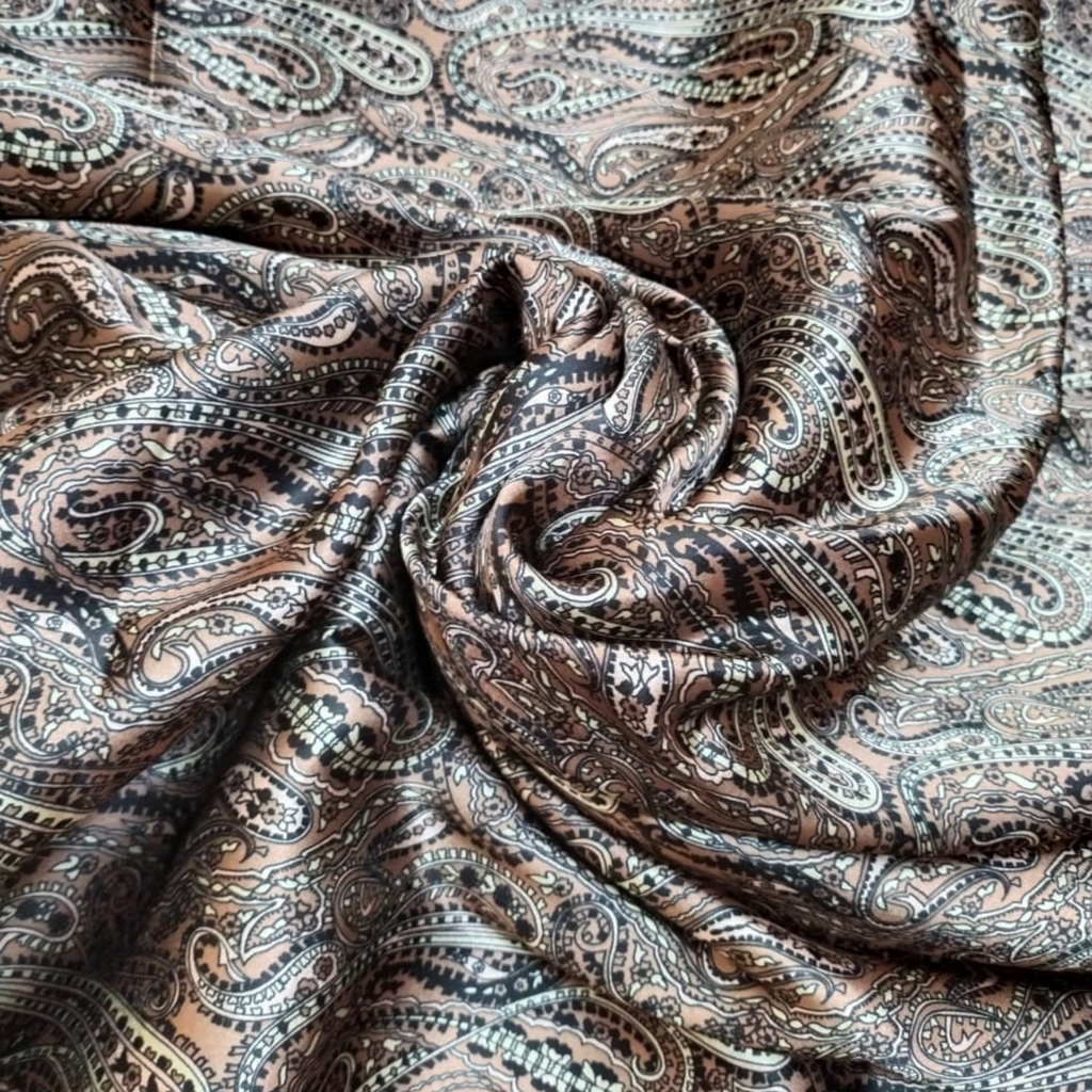 Regal Opulence: Satin Georgette Fabrics Embellished with Traditional Paisley Patterns