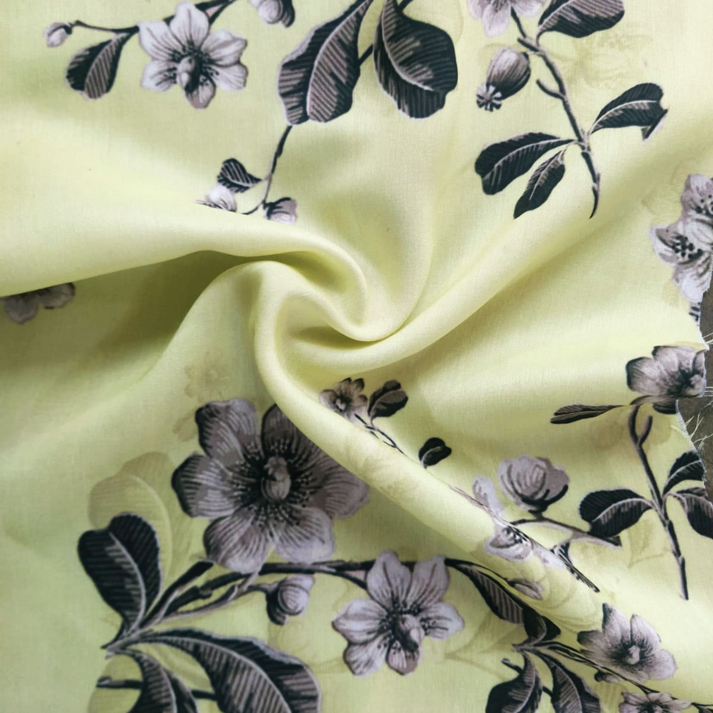 Blooming Petals: Satin Georgette Fabric Flourishing with Floral Patterns