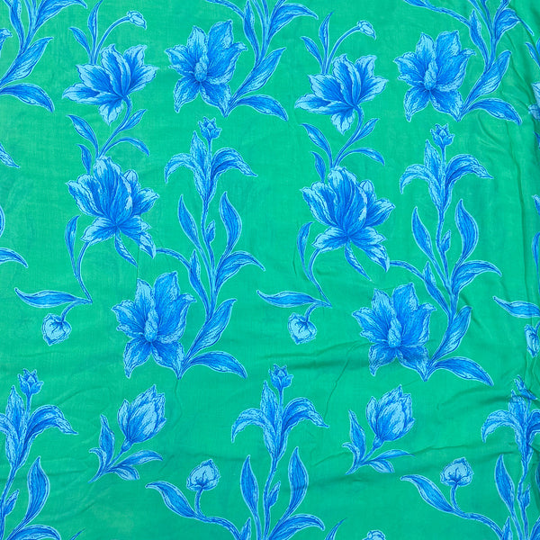Rania Big Blue Floral Print on Green Base on Pure Lilly Muslin