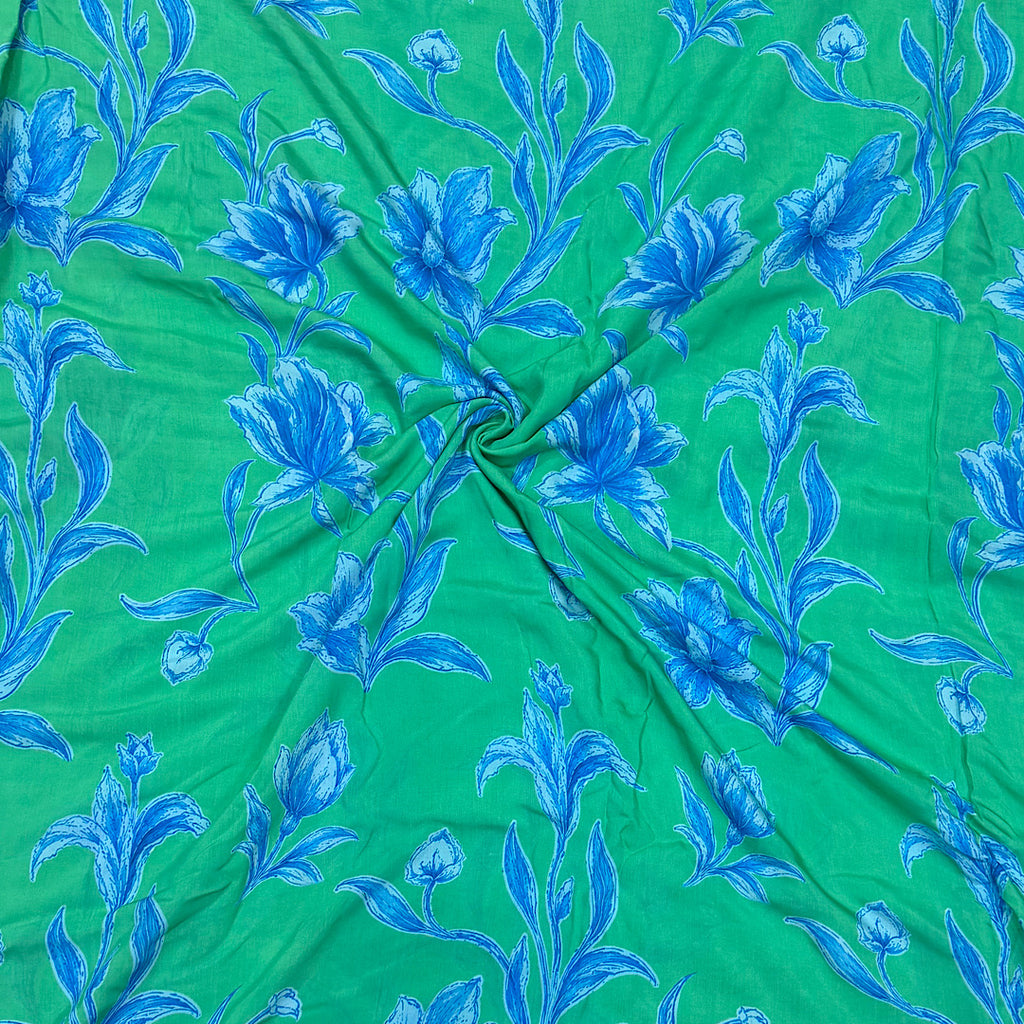 Rania Big Blue Floral Print on Green Base on Pure Lilly Muslin