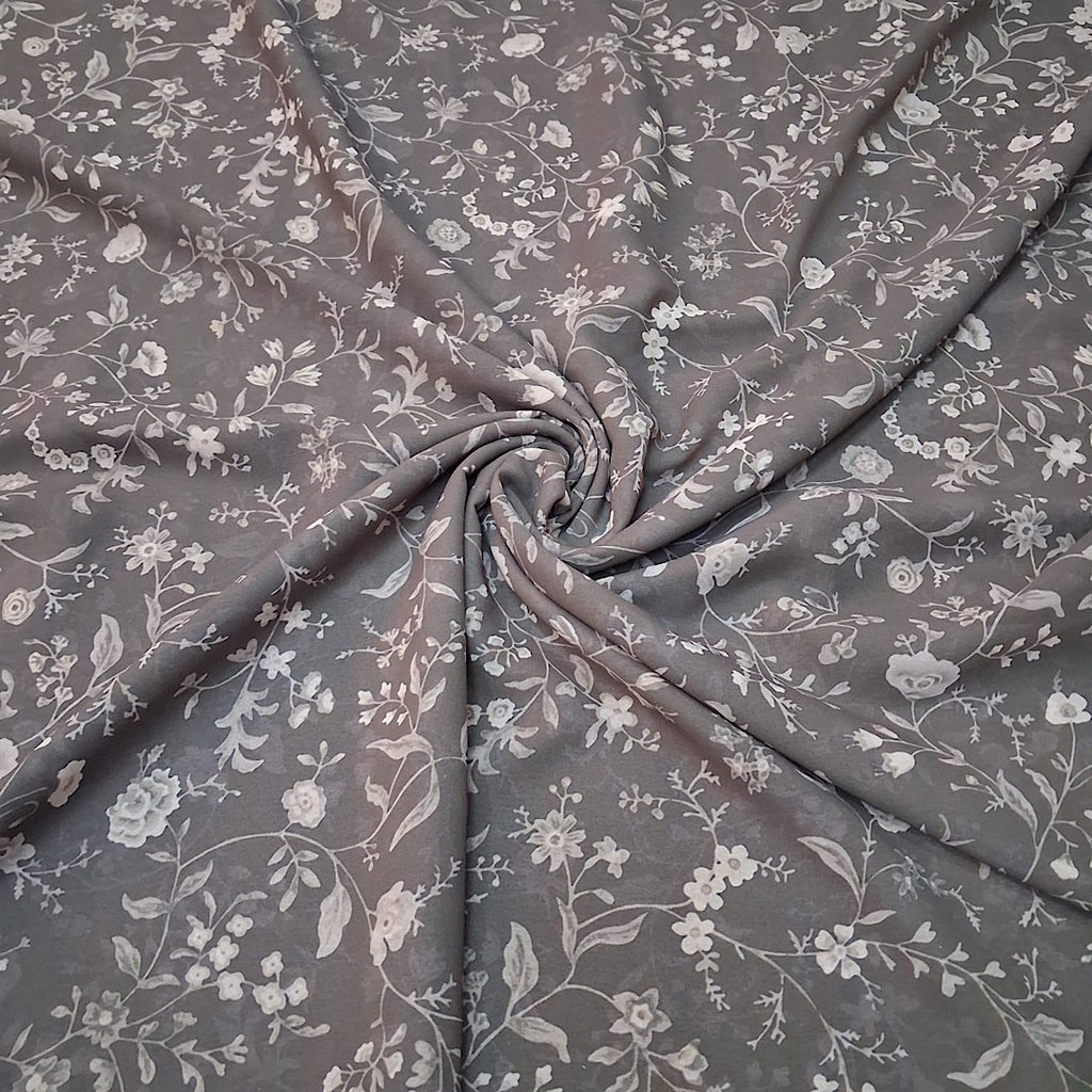 Small Floral Print in Dark Brown Base in Georgette Pooja OM PS 339