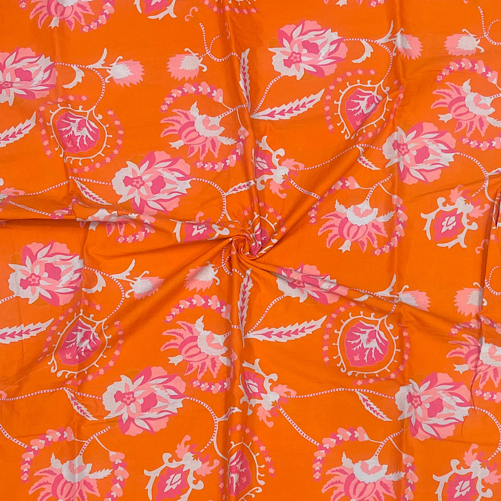 Archana Print with Orange Base & Floral Print on Pure Cotton Cambric